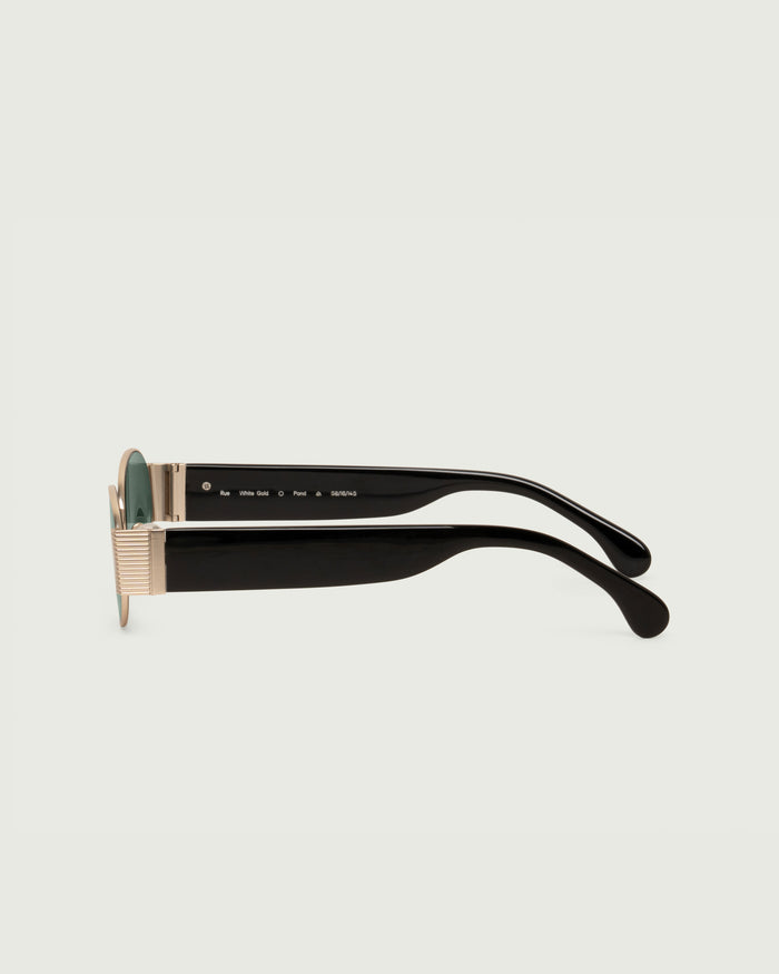 White Gold Pond::Rue Sunglasses cateye Gold metal side